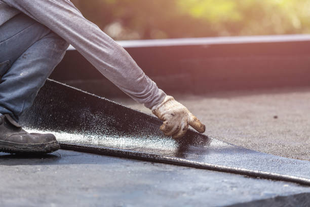 Professional Basement Waterproofing technician working in Old Westbury, NY